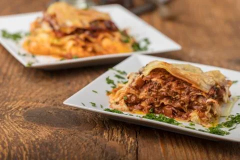 Closeup of a portion of lasagna Stock Photos