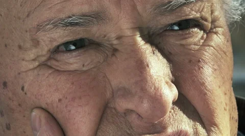 Closeup portrait of 70s, 80s old man's eyes: pensive and sad old lonely man Stock Footage 58303042