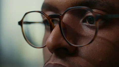 Closeup portrait of african american database developer with glasses working Video stock 168251706