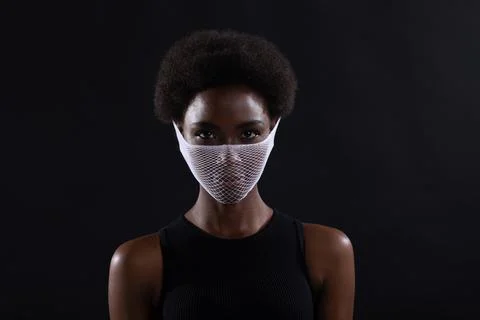 Closeup portrait of african american woman fashion model wearing quarantine Stock Photos