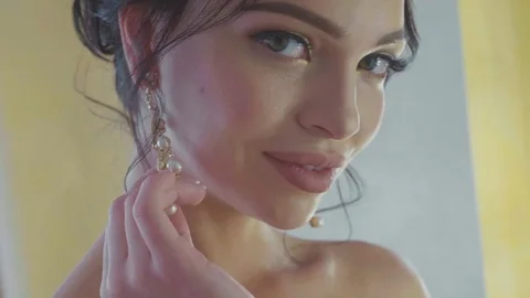 Closeup portrait of beautiful bride looking at camera and posing Stock Footage 85003175