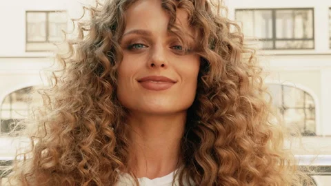 Closeup portrait of beautiful smiling model with afro curls hairstyle Stock Footage 146053222