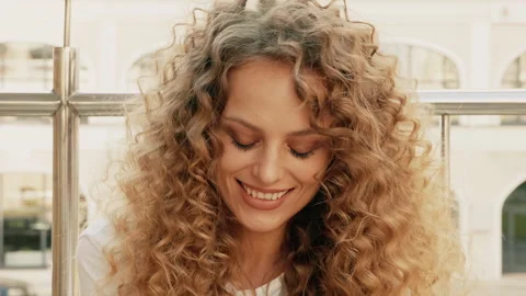 Closeup portrait of beautiful smiling model with afro curls hairstyle Stock Footage 146053577