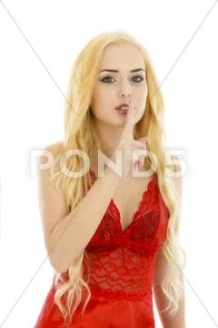 Closeup portrait of a beautiful woman making silence sign Stock Photos