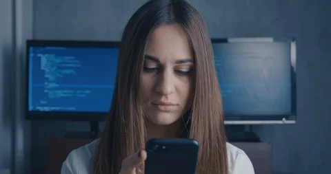 Closeup portrait. Binary code backgroundgirl programmer is testing a technique Stock Footage 102844487