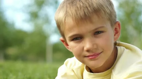 Closeup portrait of a boy looking through binoculars Stock Footage 11516230