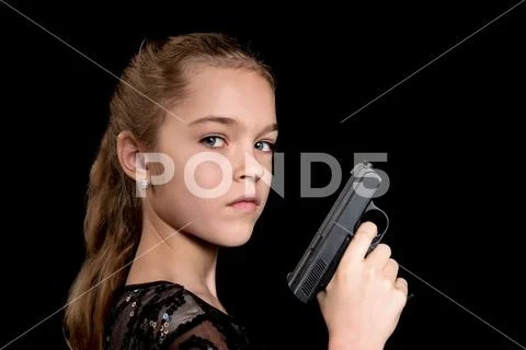 Closeup portrait of child with a gun Stock Photos