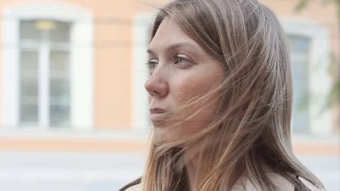 Closeup portrait of deep in thought female face looking to the side Stock Footage 77201315