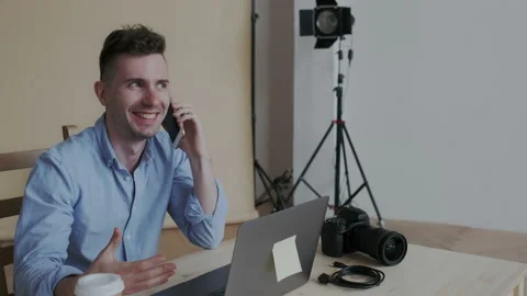 Closeup portrait. Handsome creative sociable man speaking on the phone with a Stock Footage 107780930