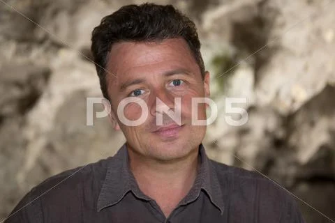 Closeup portrait of handsome male model. Beautiful eyes. Stock Photos