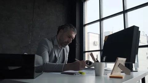 Closeup portrait of middle aged man working in office. Solid business man Stock Footage 107328197