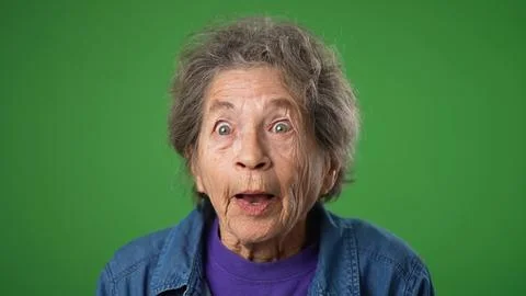 Closeup portrait of thinking, smart puzzled pensive elderly senior old woman Stock Photos