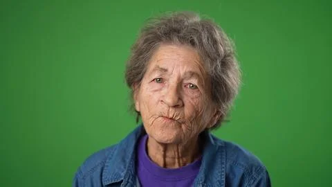 Closeup portrait of thinking thoughtful toothless elderly old toothless woman Stock Photos