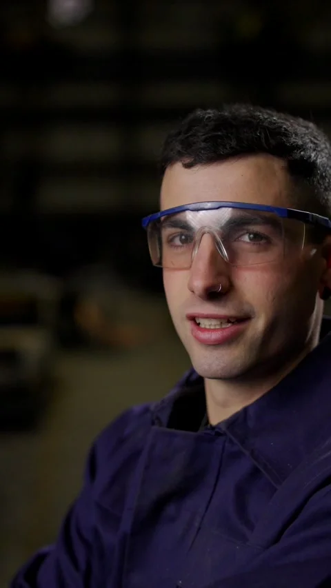 Closeup portrait of worker wearing protective eyeglasses Stock Footage 266343513