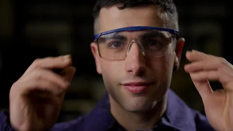 Closeup portrait of worker wearing protective eyeglasses Vídeo Stock 267306088