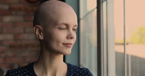 Closeup portrait of young bald optimistic female cancer patient Stock Footage 147117256