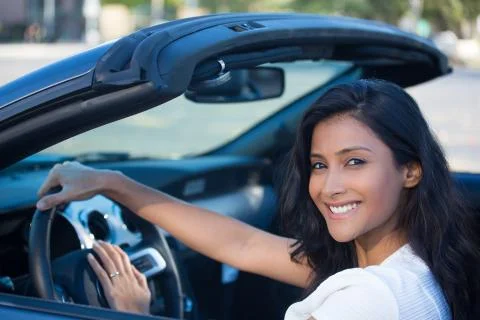 Closeup portrait young smiling, happy, attractive woman smiling from behind i Stock-Fotos