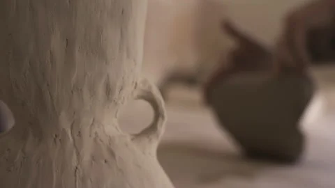 Closeup of potter working with ceramics in studio Stock Footage 235466634