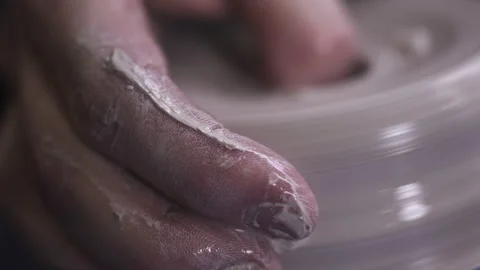 Closeup of potter working with ceramics in studio Stock Footage 235466642