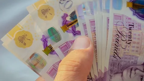 Closeup of pound notes, Man counting pounds Stock Footage 259545228