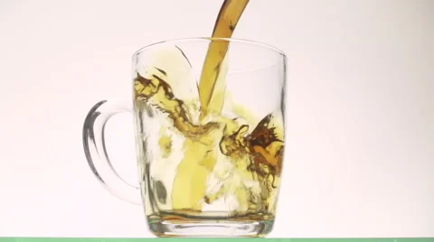 Closeup of pouring tea into cup Stock Footage 54937067