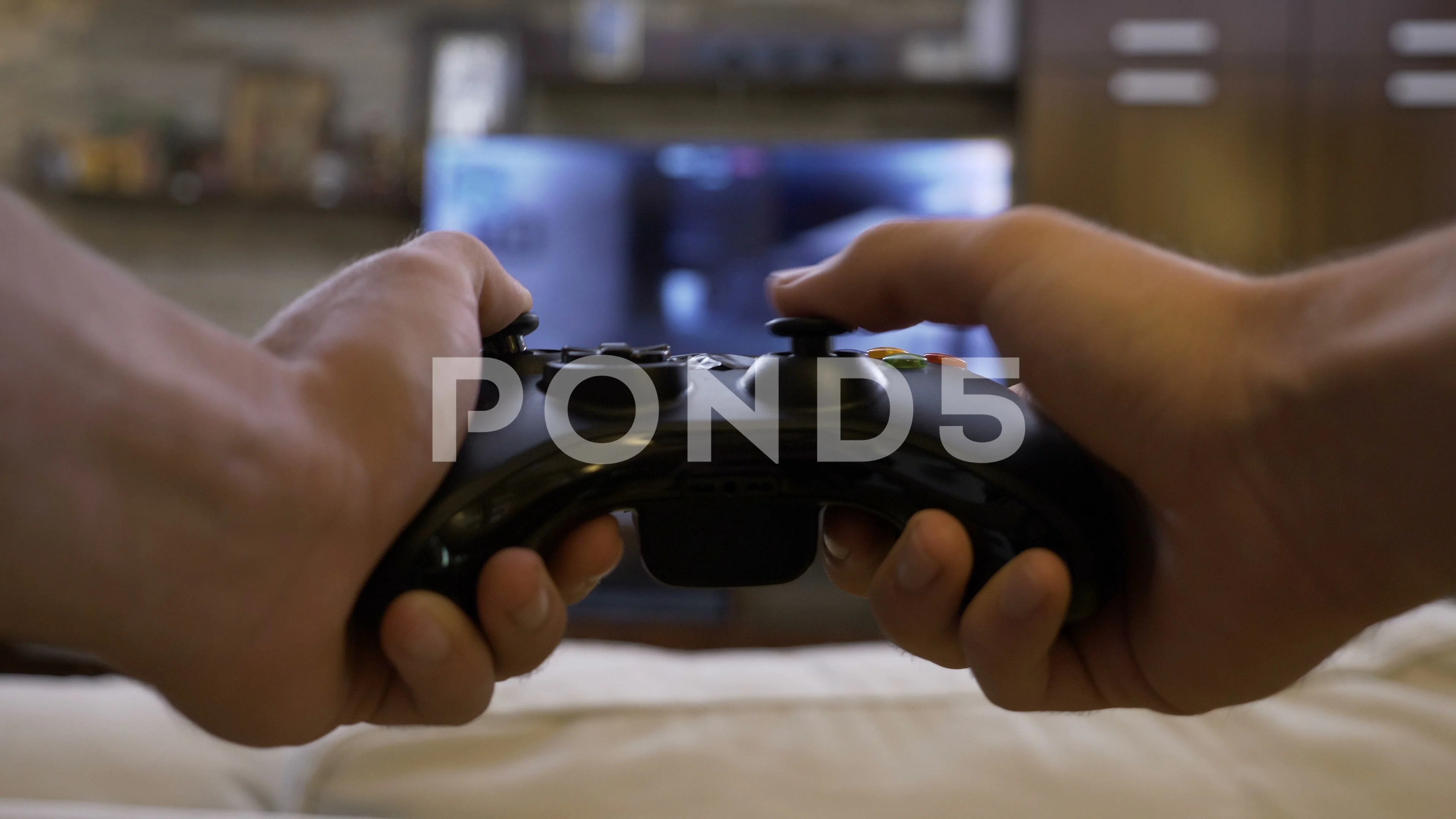 Gamepad in the hand of a gamer. Close-up. Teenagers play video games online.  Fun adventure games. Prizes, gifts, win. Fun, passion, hobby. Cybersport  Stock Photo - Alamy