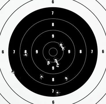 A closeup of a practice target used for shooting with bullet holes in it. Foto stock