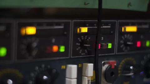 Closeup Of Preamplifier With Buttons, Knobs, And Illuminated Level Meters 스톡 동영상 309956929