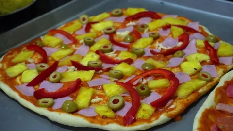 Closeup preparing homemade pizza in the kitchen Stock-Footage 164580600