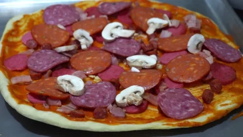 Closeup preparing homemade pizza in the kitchen Video stock 164580959