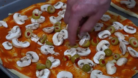 Closeup preparing homemade pizza in the kitchen 스톡 동영상 164580979