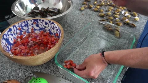 Closeup preparing mussels a la chalaca, typical peruvian food in 4k Stock Footage 189147041