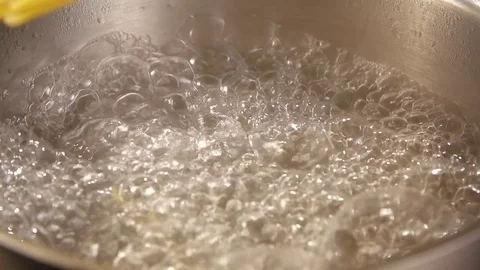 Closeup of preparing spaghetti in boiling water.  Stock Footage 72249483