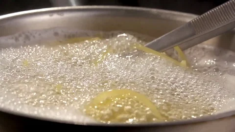 Closeup of preparing spaghetti in boiling water. Preparing pasta Stock Footage 72404980