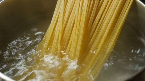 Closeup of preparing spaghetti in boiling water Stock Footage 82315234