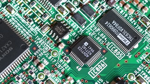 Closeup of Printed Circuit Board with Electronic Components and Microchips Stock Footage 260802973