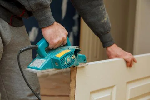 Closeup process of carpenter worker with circular saw Fotos Stock