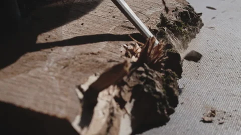 Closeup of a process with a wood board with a chisel. Artisan makes a beautiful Stock Footage 205943187