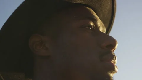 Closeup Profile of a Man in a Hipster Hat Looking up at the Sky Stock Footage 208731120