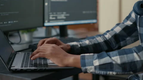 Closeup of programer hands typing machine learning code on laptop keyboard in Stock Footage 168234366