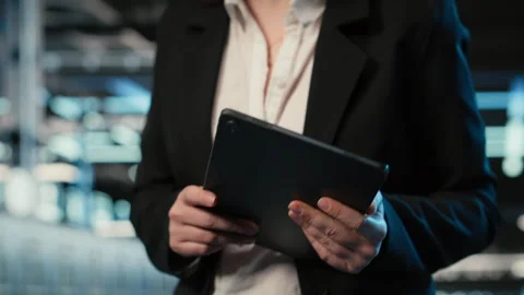 Closeup of programmer walking in data center, optimizing server load with tablet Stock-Footage 329327018