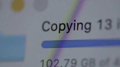 Closeup of progress bar copying data with number of GB's being copied with Stock Footage 141558871