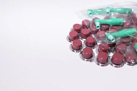 Closeup Prophy Tooth Paste With Fluoride and Green Disposable Prophy Angles with Stock Photos