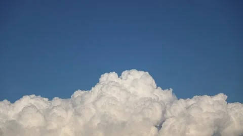 Closeup of puffy white clouds Stock Footage 143149659