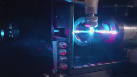 Closeup of a purple  laser cutting Quantum engineering machine Stock Footage 245839526
