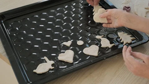 Closeup of Putting Raw Cookies on a Baking Sheet Vídeo Stock 166881017