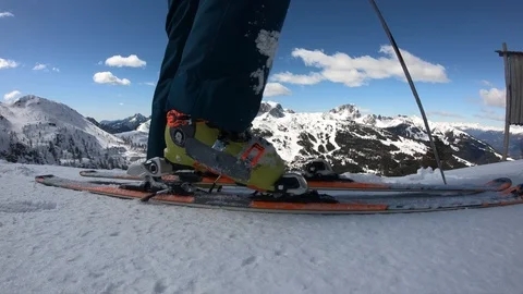 Closeup of putting on skis. Stock Footage 122213645