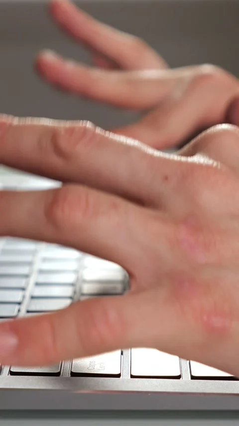 Closeup Of Quick Finger Movements Over Laptop Keyboard During Intense Activity Stock-Footage 334887644
