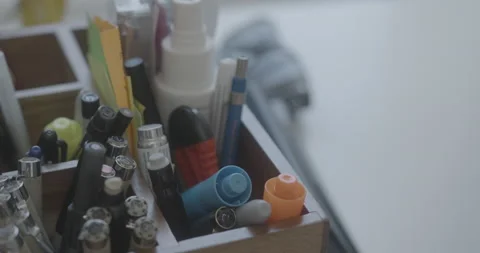 Closeup Rack Focus of Pencil Caddy at Desk with Sunglasses in Foreground Stock Footage 209595636