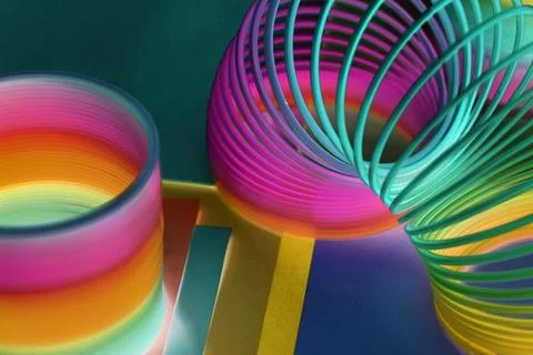 Closeup of rainbow spring toy background Stock Photos